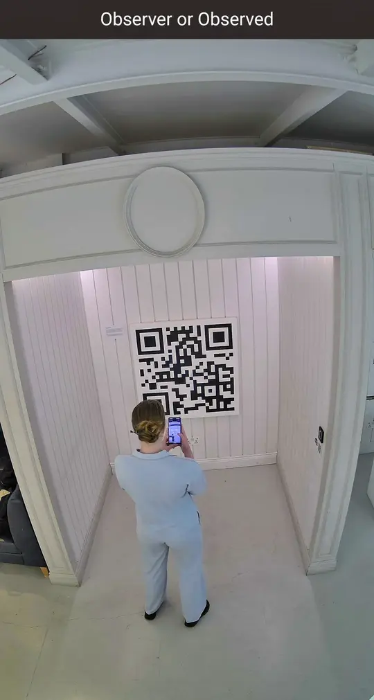 Viewer scanning the QR code
