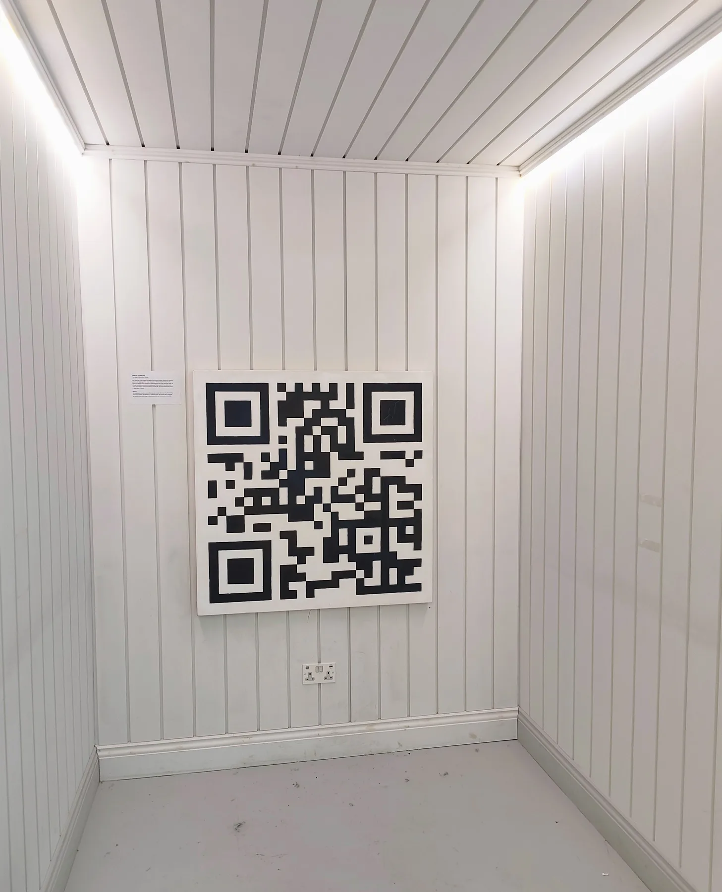 Installation view of the QR code painting in the gallery